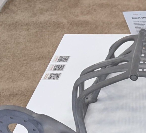Aluminum metal additive robot sternum lattice blank on a white display table