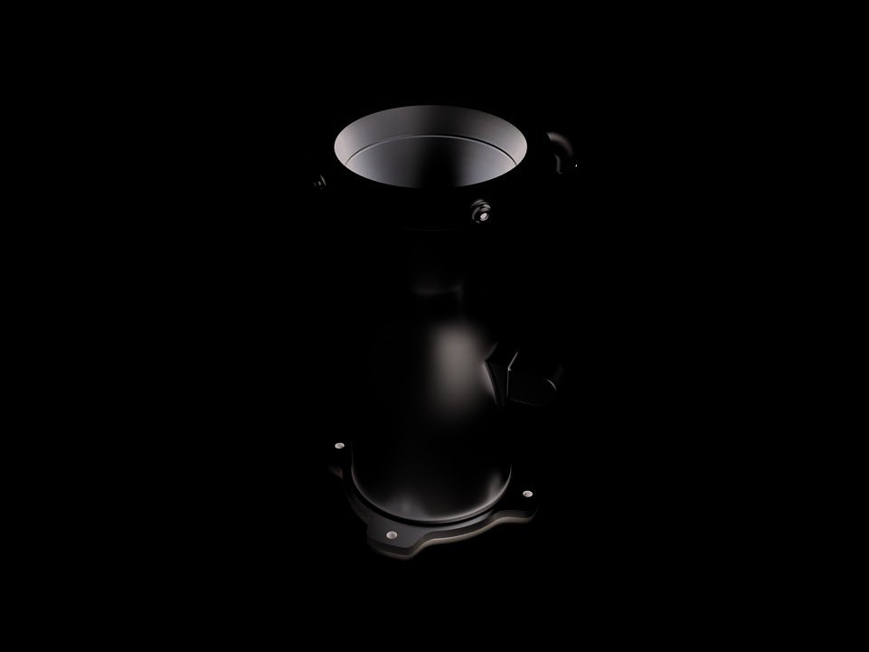 Metal additive aerospace flanged duct housing blank on a black background